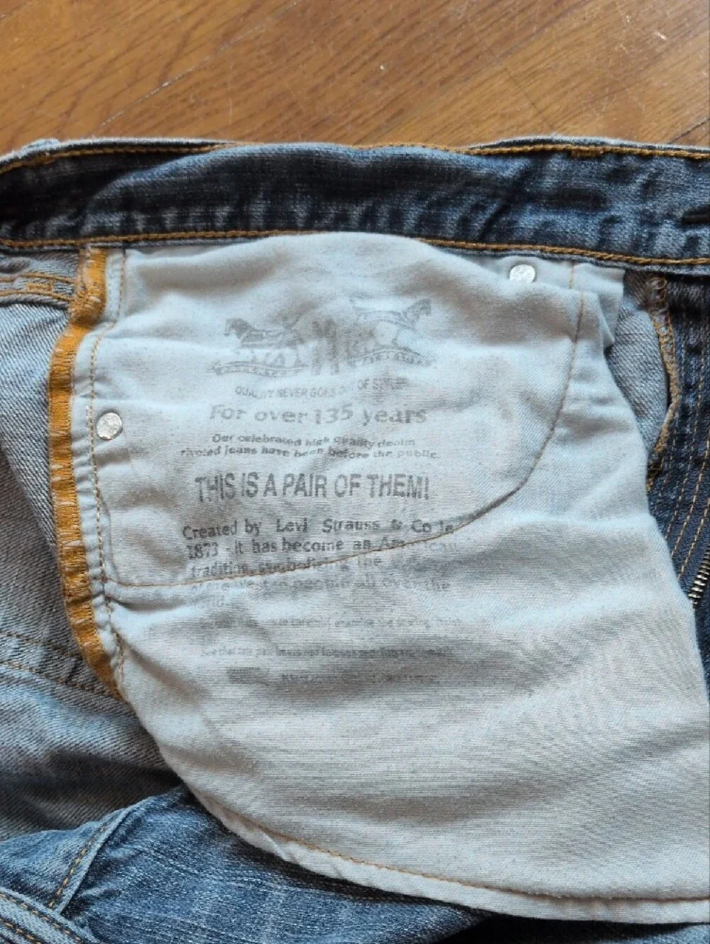 Levi's 505 Men's Straight Jeans in Blue with Knee Rip